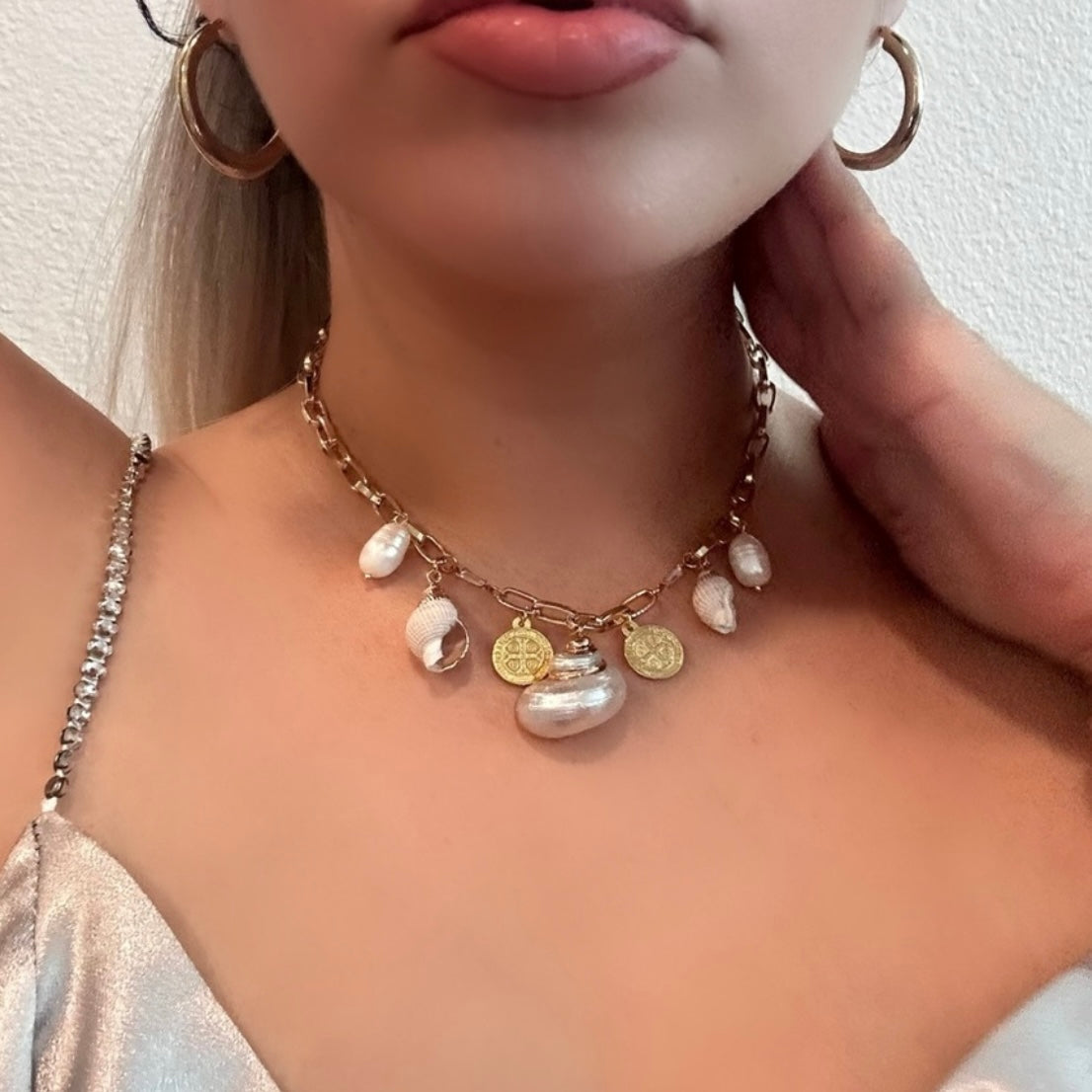 Selena Dulce shells x saints necklace